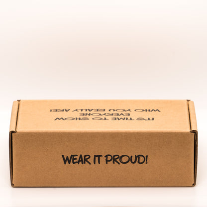 Cardboard box with 'Wear it proud!' text on the rear, on a white background.
